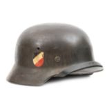 A Third Reich M40 double decal Army helmet, dark grey/green with tricolour and Army eagle decals, by