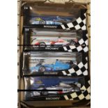 4 Minichamps 1:18 scale Formula 1 racing cars. A scarce British American Racing (BAR) 01 Supertec