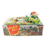 A 1950’s Technofix German Cable Car toy. Comprising colourful printed tinplate base with ‘