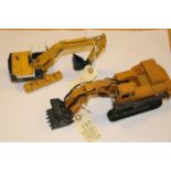 2 Japanese produced die-cast Komatsu Crawler Excavators. These examples were made approximately 25