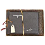 2 unused WWII period German photograph albums, one cover bearing a grey metal eagle and swastika and
