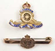 An enamelled gold “sweetheart” badge of The R Artillery, well detailed cannon, marked “9ct Gold”,