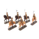 6 Elastolin mounted British Lancers in tin helmets. Wire ‘lances’ with pennants, on wooden bases. GC