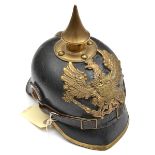 An Imperial German Oldenberg enlisted man’s pickelhaube, with regulation brass mounts, the eagle