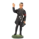 A composition figure of Rudolf Hess. Stamped on base but illegible. Standing saluting in black