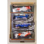 4 1:18 scale Pauls Model Art Formula 1 single seat racing cars. 2 McLaren-Mercedes- MP410 RN7 N.