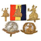 5 Norfolk Regt badges: 1st patt cap bi-metal and WWI all brass, seated Britannia NCO’s large