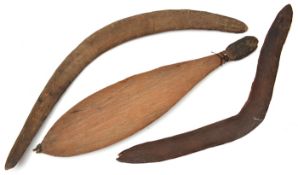 An early Australian boomerang, 23” in length, (small chip from one end); another, 27” (fracture to