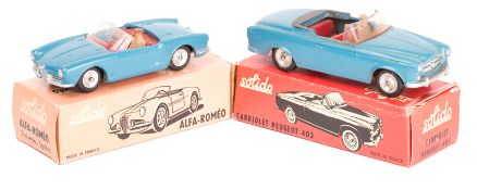 2 Solido sports cars. An Alfa Romeo Giulietta Spider in blue with red interior. A Peugeot 403