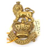 A Vic brass valise slide of The R Marines, lion on crown and motto scroll “Per Mare per Terram”. GC