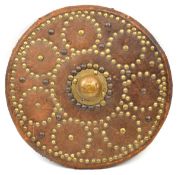 A 19th century Gothic Revival Scottish targe, of brown leather on wood, brass central boss and