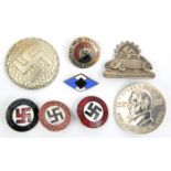 A Third Reich Volkswagen Werkes Mai 1938 lapel badge; a DVG lapel badge; 4 other enamel party