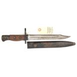 A scarce WWII bayonet for the Jungle carbine, in its original steel scabbard. GC