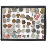 A collection of 61 Third Reich pressed metal, aluminium and plastic “day” badges, commemorative