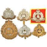 5 Suffolk Regt cap badges: Vic, KC 1st castle, 2nd castle and all brass, ERII; a Vic Suffolk