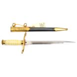 An East German dirk, double fullered blade 9½”, no 1095 at forte, gilt shallow S shaped crossguard