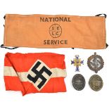 A Third Reich Hitler Youth arm band, an “S E L C” National service arm band; 2 wound badges, a