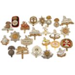 23 different infantry cap badges, including Northumberland Fus brass and bi-metal, Kings Roman and