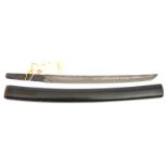 The cut down blade from a Japanese sword wakizashi, tip re-shaped, tang re-formed from the blade