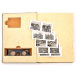 A Third Reich album “Der Kampf Im Westen”, contains coloured photographs, also a stereoscopic viewer