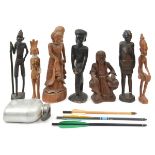 7 various carved wooden figures of African, Polynesian, etc, interest, and an alloy water bottle.