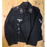 A Third Reich black panzer tunic, the lining stamped with RB number, size, and manufacturer’s