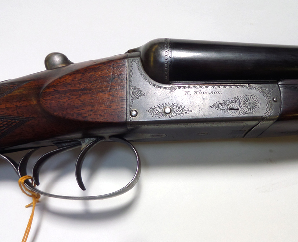 *A DB 12 bore top lever hammerless boxlock ejector shotgun, by H Hodgson, Bury St Edmunds & Ipswich, - Image 2 of 2