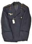 A Third Reich flight section officer quality 4 pocket jacket, with embroidered breast eagle and