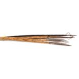 2 Pacific Islands dark wood bows, of flattened oval section, with bamboo drawstrings, 56” and 58”