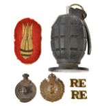The body of a WWII No 36 hand grenade, with later replacement rifle discharge disc, base plug,