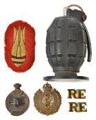 The body of a WWII No 36 hand grenade, with later replacement rifle discharge disc, base plug,