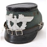 A Third Reich police shako, field grey body, black patent top and peaks, alloy mounts, marked inside