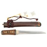 A Japanese dagger aikuchi, blade 18.2cms, mumei, suguha hotsure hamon, fair polish. Brass kashia and