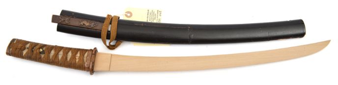 The koshirae (fittings) from a Japanese sword wakizashi, wooden “blade” 40cms, tape bound copper