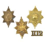 3 Worcester Regt brass star valise badges, lion in Garter centre, lion and “Firm” centre and