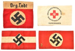 4 Third Reich cloth arm badges: Hitler Youth, NSDAP with superimposed metal pip and figure “2”,