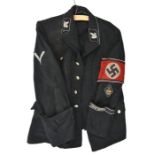 A Third Reich black tunic, with beaded silver buttons and SS insignia, comprising collar patches