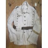 A Third Reich Luftwaffe white cotton drill jacket, buttoned centrally with press stud side flaps,