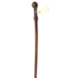 An unusual Zulu Chief’s staff, the stem of very slightly tapered form, with a carved studded band at