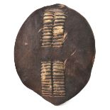 A small Swazi ovoid dark hide shield, slotted central bands, 22” x 18”. GC