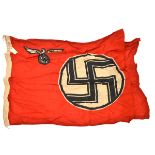 A Third Reich Reichsdienstflagge, the hoist with sewn on label “Reichadflg. Kreiss Augsburg”, and