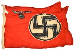A Third Reich Reichsdienstflagge, the hoist with sewn on label “Reichadflg. Kreiss Augsburg”, and