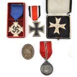 Third Reich medals: War Merit Cross 1st class without swords, in its box (the box damaged), Faithful