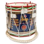 A painted brass side drum of the 1st Bn The Queen’s Royal Regt, with title scroll, regimental badges