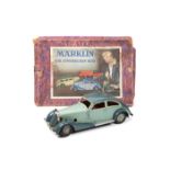 A rare Marklin Car Construction Set. A large scale tinplate clockwork 2-door coupe. A ‘made up’