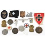 13 various Third Reich pressed metal, aluminium, printed tin and enamelled commemorative badges,