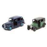 2 Dinky Toys. Austin FX3 Taxi (40h). In dark blue, with light blue wheels, black chassis, interior &