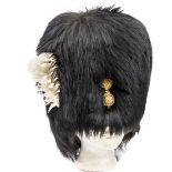 A late Vic officer’s bearskin cap of The Royal Fusiliers, white feather plume in socket on right,