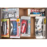 A quantity of 1:24 racing cars by Polistil, Revell, Onyx, Majorette, etc. Including: 2x Williams