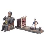 2 cast iron copy money banks. A Football Bank. Player kicks the coin into the goal when the lever is